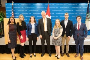 Mansi Gaur (L'22), Grace Stokan (L'20), Laurie Morgan (L'20), Ambassador Jacques Pitteloud, Amy Uihlein (L'20), Lukas Lanzrein (LL.M.'20) and James Carey (L'21). 