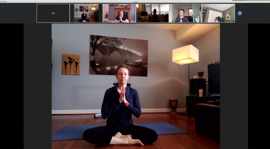 Wendy Christensen leads a group yoga class.