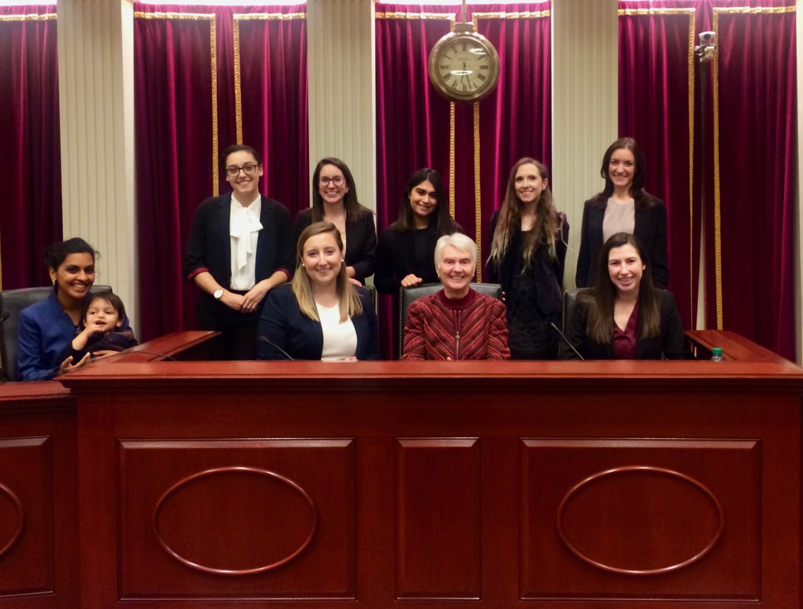 Fall semester Student Advocates Karuna Srivastav, Kayla Svihovec, Clara Mora, Neilab Rahimzada, Alicia Ceccanese, Amanda Strayer, Hannah Kaufman, and Makenna Osborn with Professor Ross in the Supreme Court Institute Moot Courtroom after wrapping up their final oral arguments. 