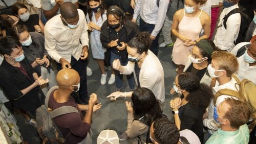 At Game Night, RISE students bond over a fierce Rock-Paper-Scissors battle.