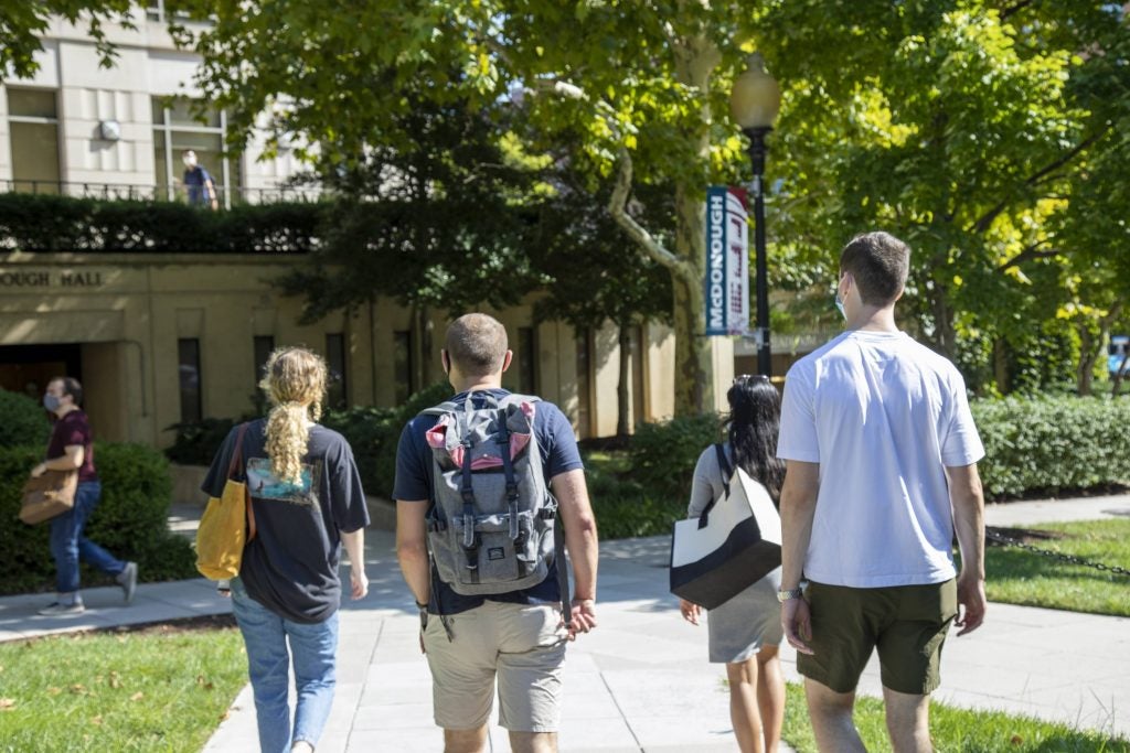 students walking on campus