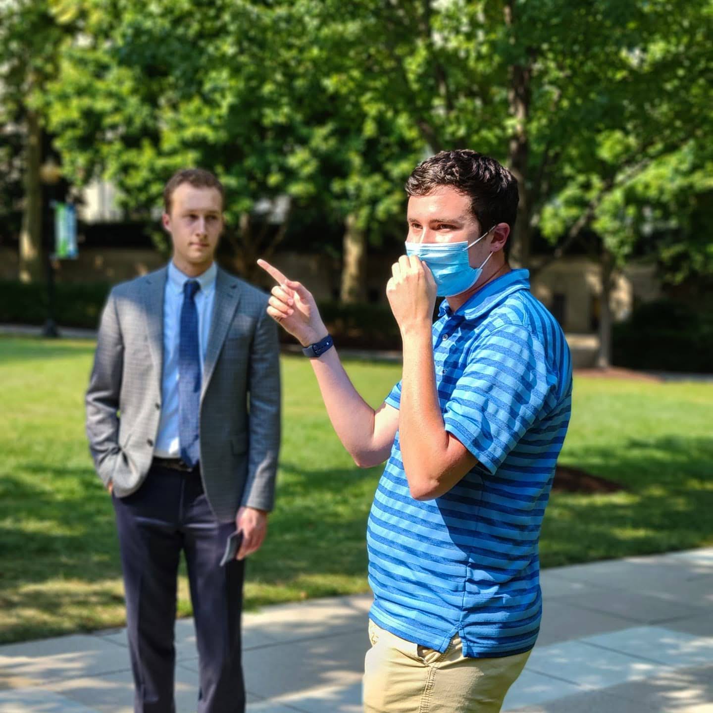 student tour guide and tour group