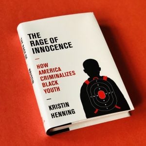 Book cover showing outline of youth with shooting target overlay