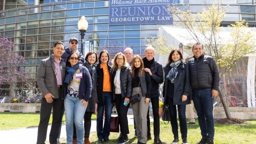 A group of alumni on the Georgetown Law campus