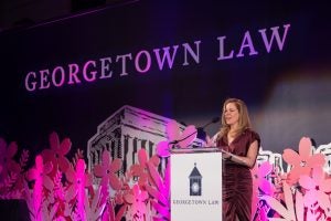 Georgetown Law Alumni Board chair Miriam Vogel (L'01) addresses the audience at the Reunion Gala