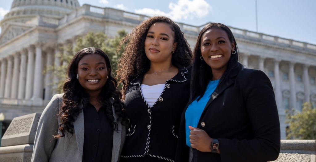Georgetown Law students Odunayo Durojaye, Cheyenne Freeley and Jade Baker on Capitol Hill to attend confirmation hearings for Supreme Court nominee Ketanji Brown Jackson.
