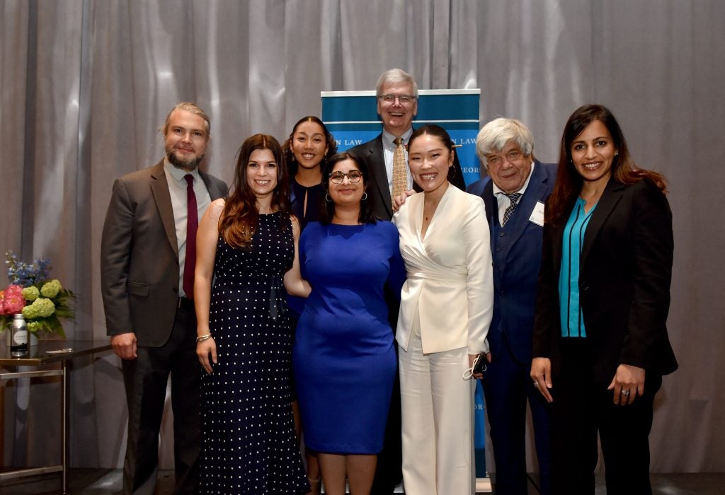 Past and present Georgetown Law Journal editors posed together