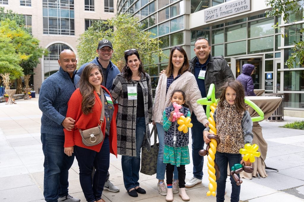 A group of alumni and their kids at the 2022 Reunion family picnic