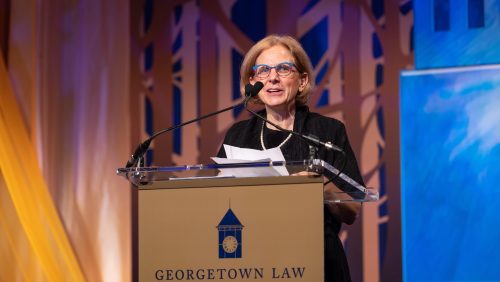 Amy Uelmen at the podium at the reunion gala