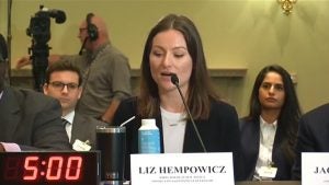 Photo of Former Clinic student Will Twomey, POGO Director of Public Policy Liz Hempowicz, and former Clinic student Sierra de Sousa at the Committee on House Administration’s “Examining Stock Trading Reforms for Congress” hearing.