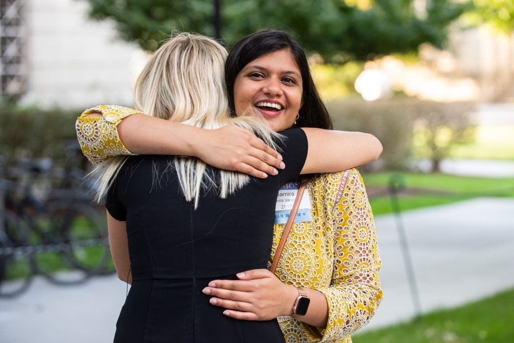 Two women embracing at the 2022 reunion