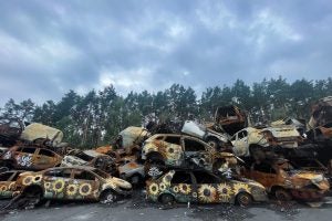 Burned-out cars in Irpin, Ukraine (Photo courtesy of Anna Cave)