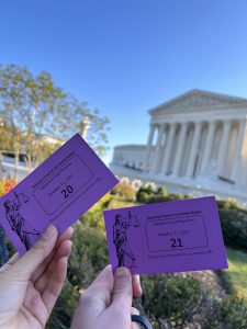 Two visitor passes for the Supreme Court