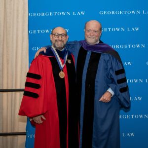 Prof. Joshua Teitelbaum standing with Dean William M. Treanor