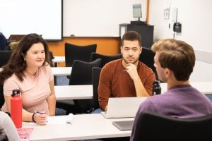 Students and fellows in the Week One course "Questioning Witnesses" practice their deposition skills.