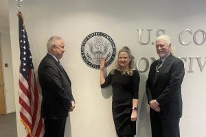 (L-R) Commission Staff Director Mauro Morales, Professor Victoria Nourse and her husband, Richard Cupitt