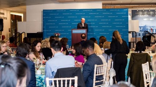 Dean William M. Treanor gives an introduction for each awardee during the Women's Forum luncheon.