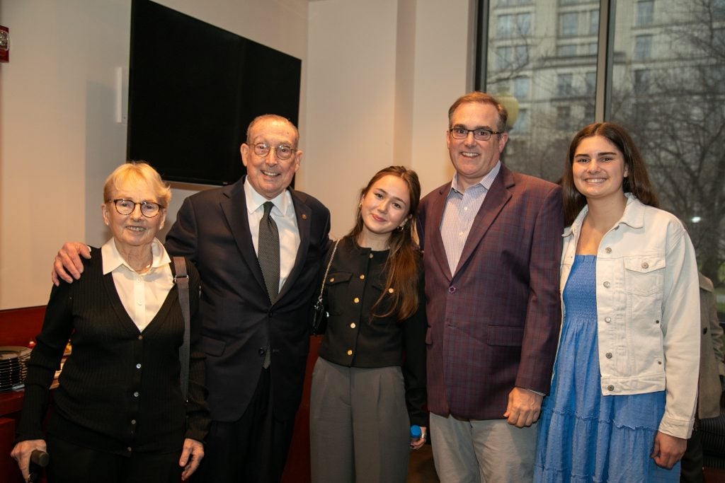 Paul Saunders (second from left) poses at the Feb. 28 named professorship ceremony with his family.