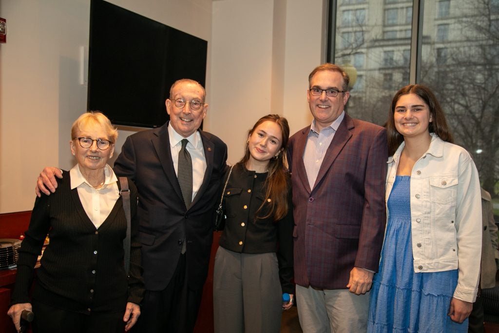 Paul Saunders (second from left) poses at the Feb. 28 named professorship ceremony with his family. 