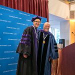 Prof. Itai Grinberg poses with Dean Treanor at a Feb. 28 ceremony honoring five new named professors.