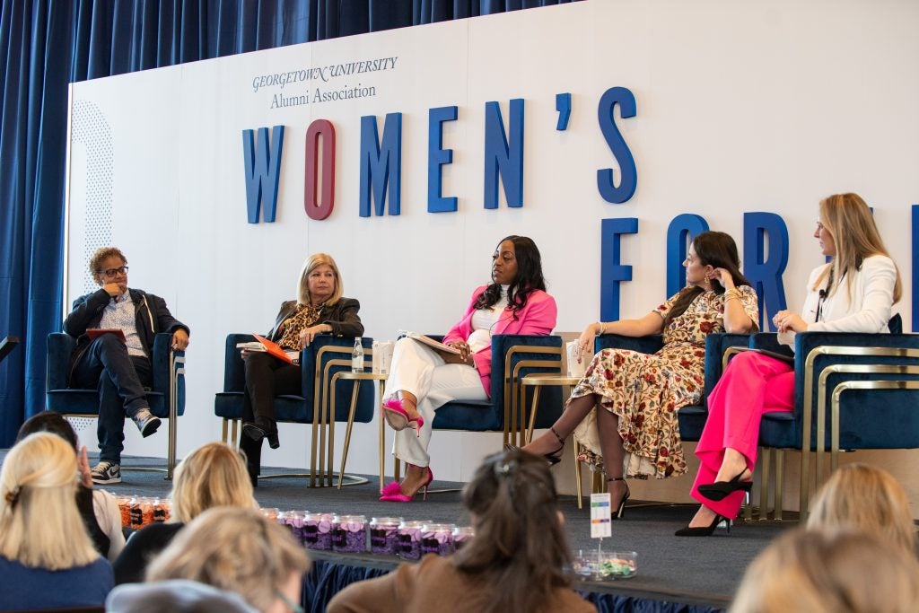 Kimberlee Davis (second from left), F’80, L’83, speaks on the panel "Women as Wealth Creators"