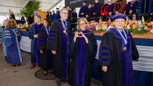 Georgetown Law's Director for Mission and Ministry Amy Uelmen, C’90, L’93, S.J.D.’16, poses for a photo at Sunday's ceremony.
