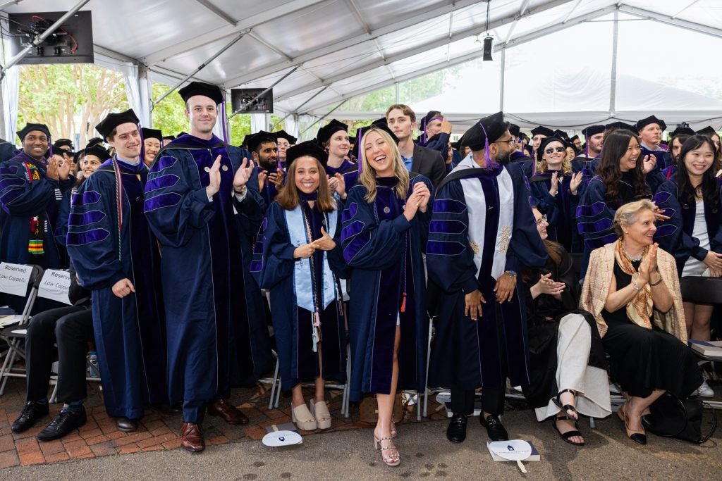 Students applaud at the commencement ceremony held Sunday, May 19 on Georgetown University's historic Hilltop campus.