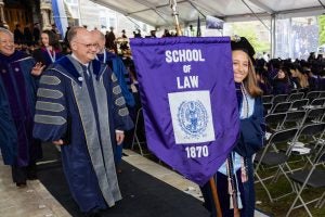 Georgetown University President John J. DeGioia and Georgetown Law Student Bar Association President Stephanie Houghton, L'24, process out of Sunday's ceremony.