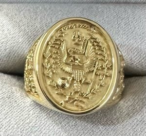 A picture of the custom class ring the brothers designed, which commemorates Georgetown and the other institutions they’ve attended while each earning five degrees over the past 11 years.