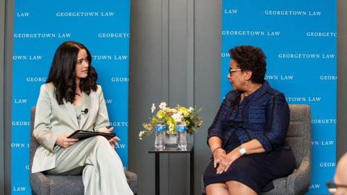 Alexis Marvel and Former Attorney General Loretta Lynch conversing at the 2024 Georgetown Law Journal Banquet on 