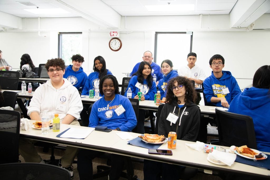 Bryant High Senior Class President Sean McNally poses for a picture with his classmates during a visit to the Law Center this spring. 