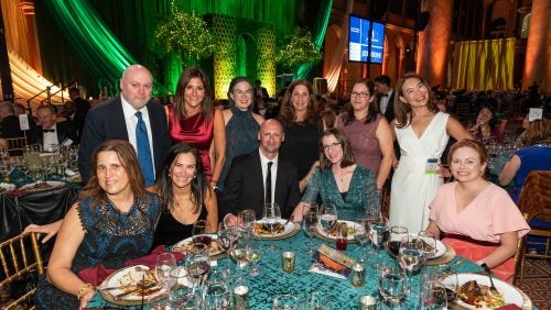 Guests at the 2024 Reunion Gala pose for a picture. 