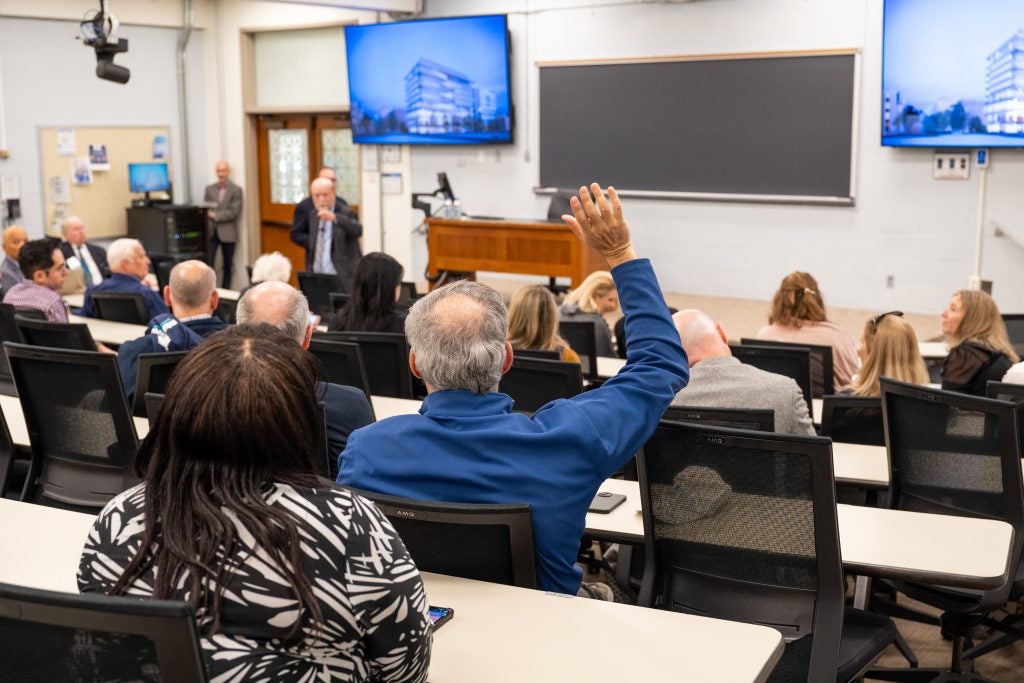 Alumni raised their hands to ask questions during the 2024 "State of the Law Center" town hall.