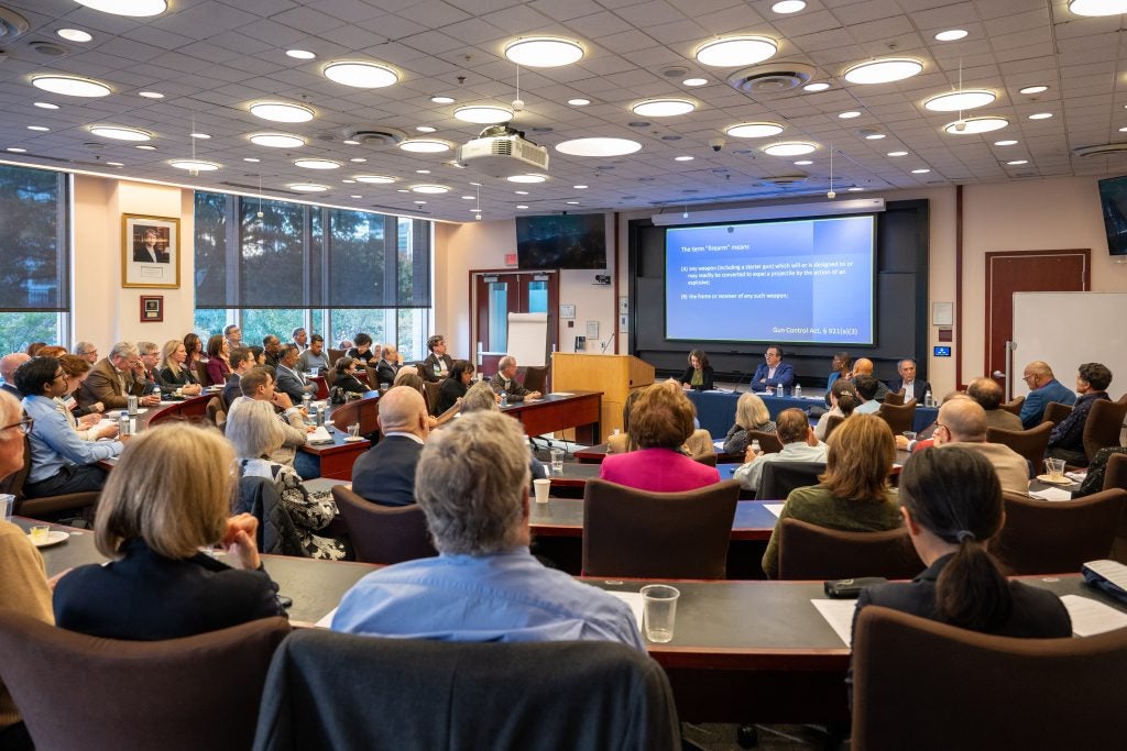 Alumni filled a classroom to hear analysis of the current Supreme Court term.