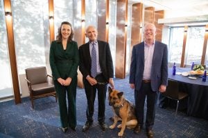 L-R: Vice Dean Lilian V. Faulhaber; Judge David S. Tatel and his guide dog, Vixen; Professor from Practice Cliff Sloan.