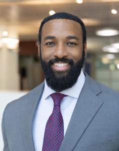 Jamal Mtshali wearing a suit