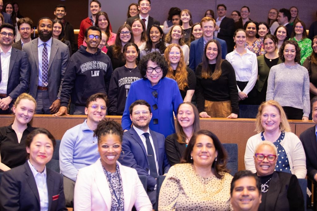 Justice Sotomayor poses for a photo with the students, faculty and staff in attendance.