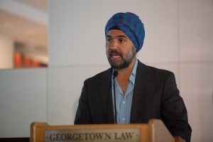 Adjunct Professor Arjun S. Sethi speaks at the awards luncheon.