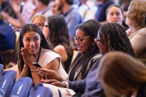 New students eagerly anticipating the 2025 Faculty Moot, one of the highlights of each year’s orientation week.