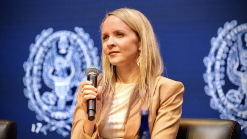 Stephanie Barclay holding a microphone